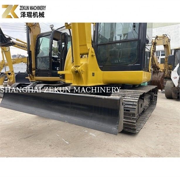 Komatsu PC56-7 Mini Excavator o masie roboczej 5 ton i trwałym silniku wysokoprężnym